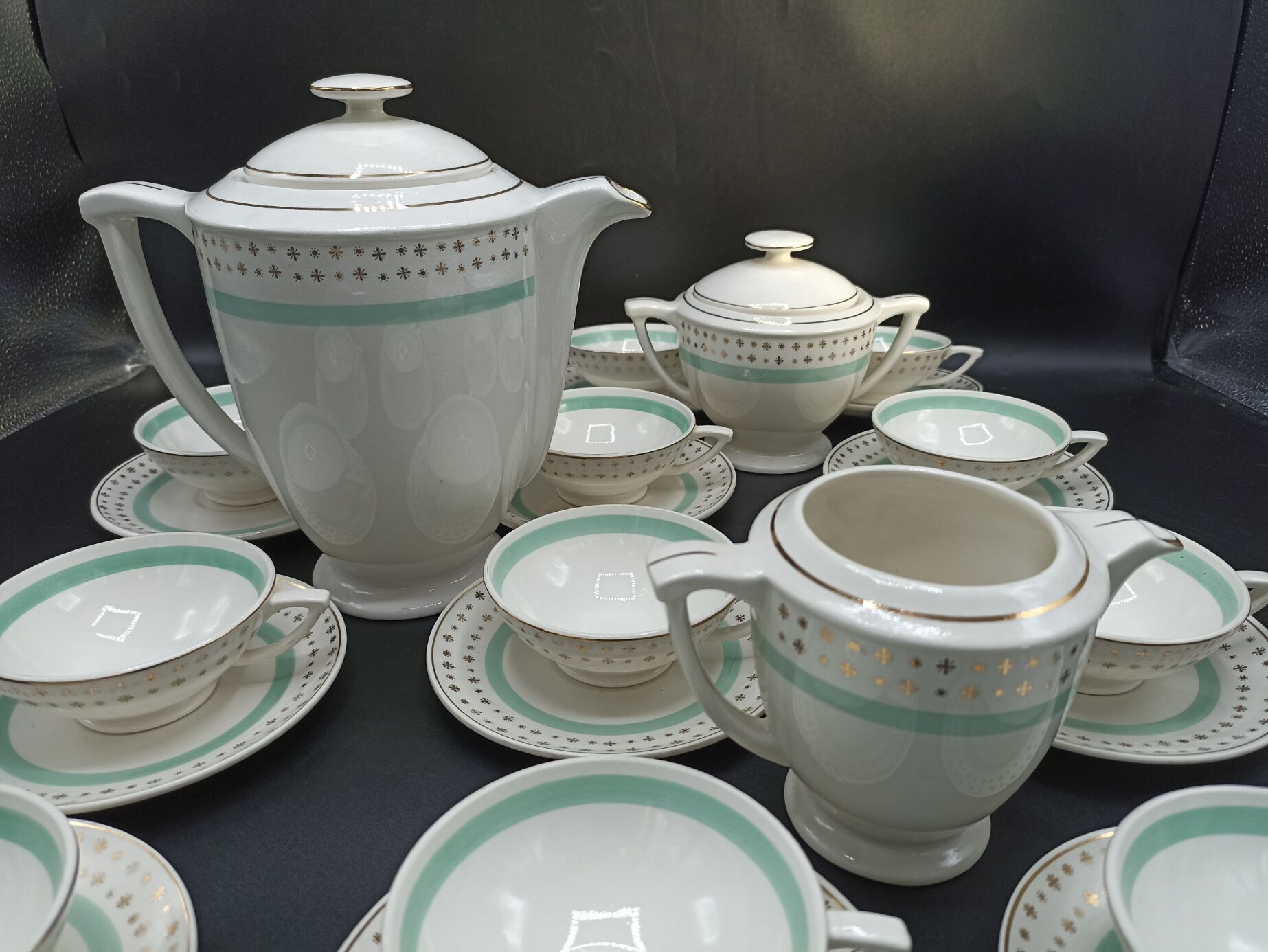 Tea set stars and mint green in semi-porcelain