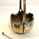 silver metal sugar bowl with gold patina