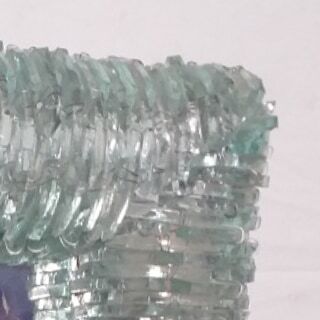 Brutalist mirror in postmodernist glass shard 1980