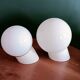 Deux appliques boule en opaline