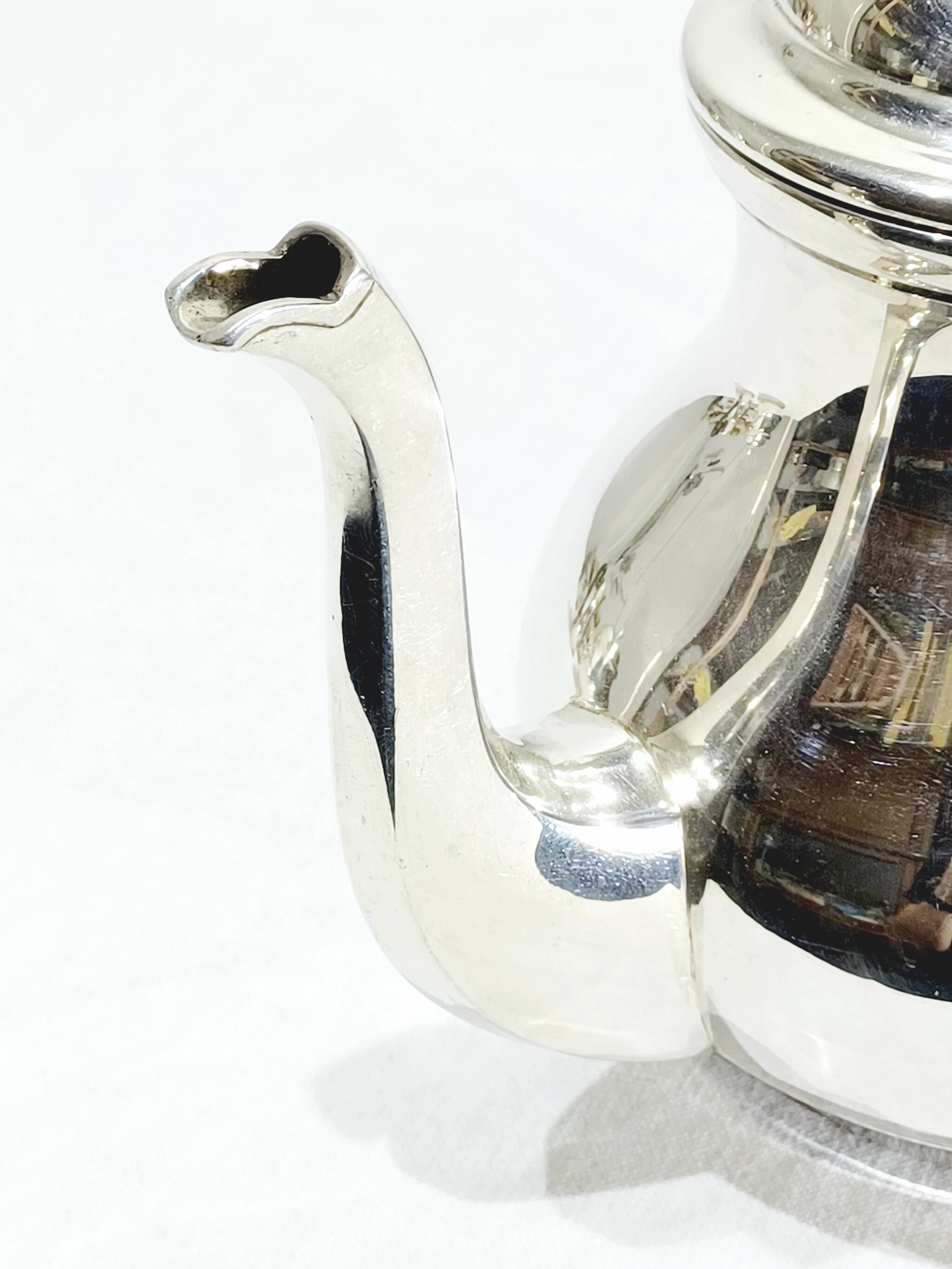 3-piece silver and ebony tea set