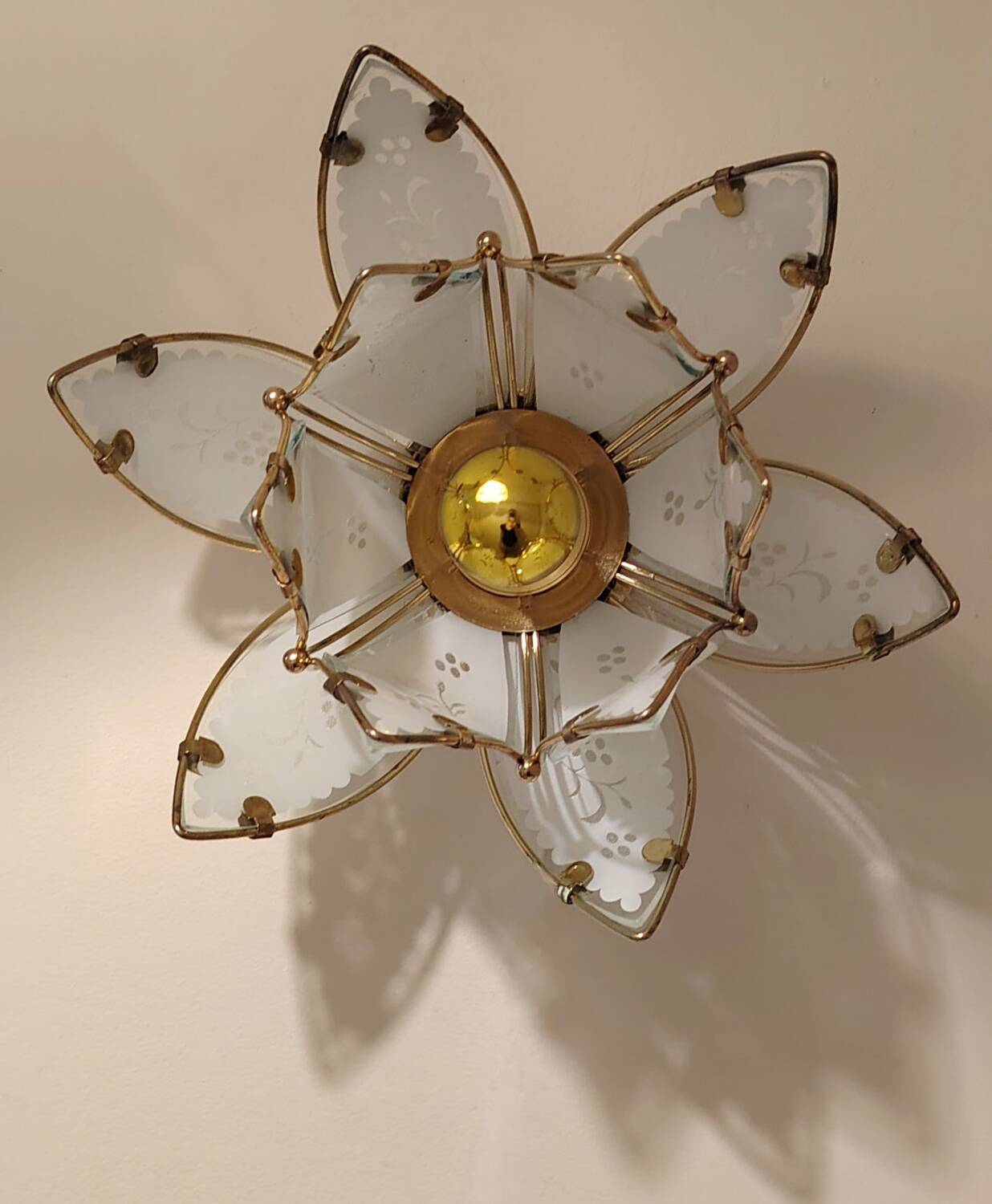 Lotus flower wall sconce in glass with a gold brass rim