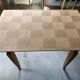 Oak dining table with a checkerboard top and extensions.