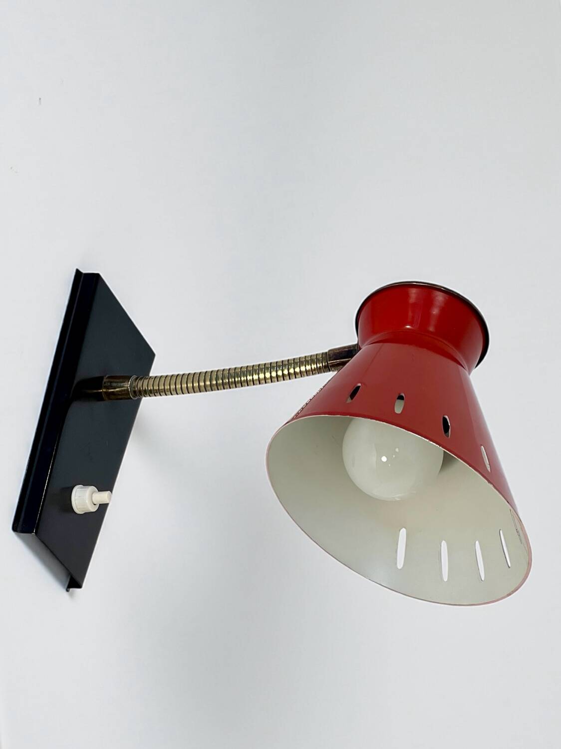 Vintage diabolo wall sconce in the style of René Mathieu