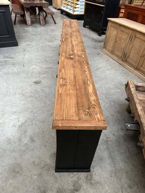 Old piece of furniture transformed into a TV stand