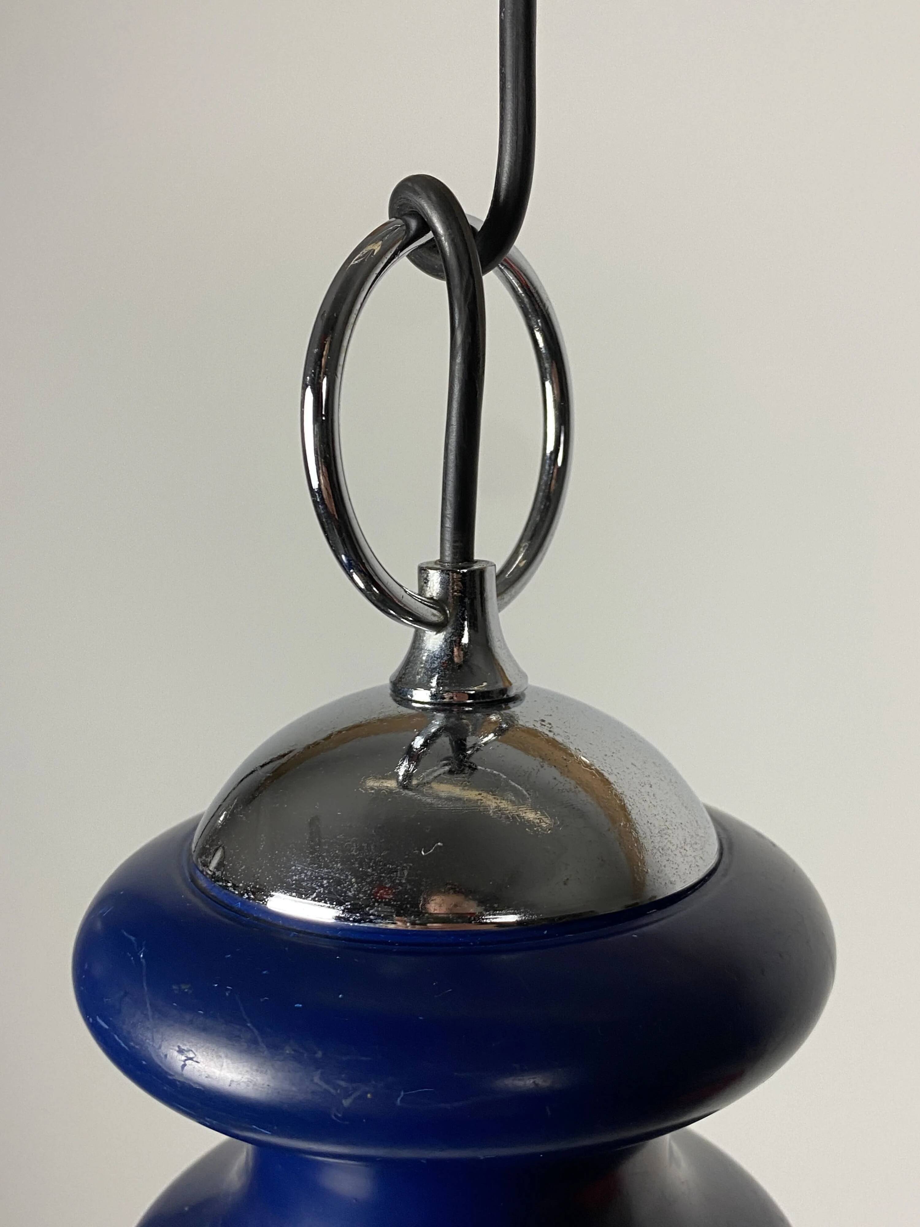 Vintage glass sphere with blue metal pendant from the 1970s.