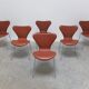 'Series 7' chairs in cognac leather by Arne Jacobsen for Fritz Hansen, 1955