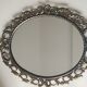 Ancien miroir ovale de style Baroque, Rococo en régule doré