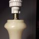 Beautifully carved onyx lamp stand, with 3 brass rings