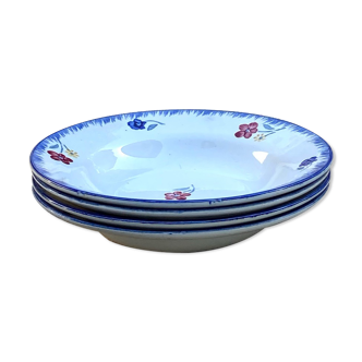 Série de 4 assiettes en faïence motif fleurs