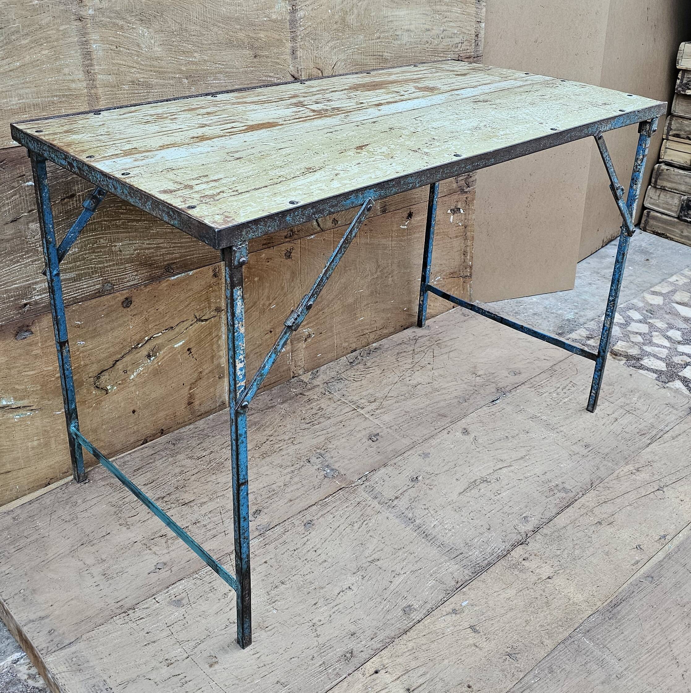 Old folding table in Burmese teak and steel