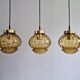 Set of 3 amber glass pendant lights, RAAK Amsterdam, 1970