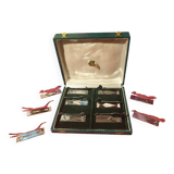 Set of 11 Art Deco knife holders signed Yorel in Piery case