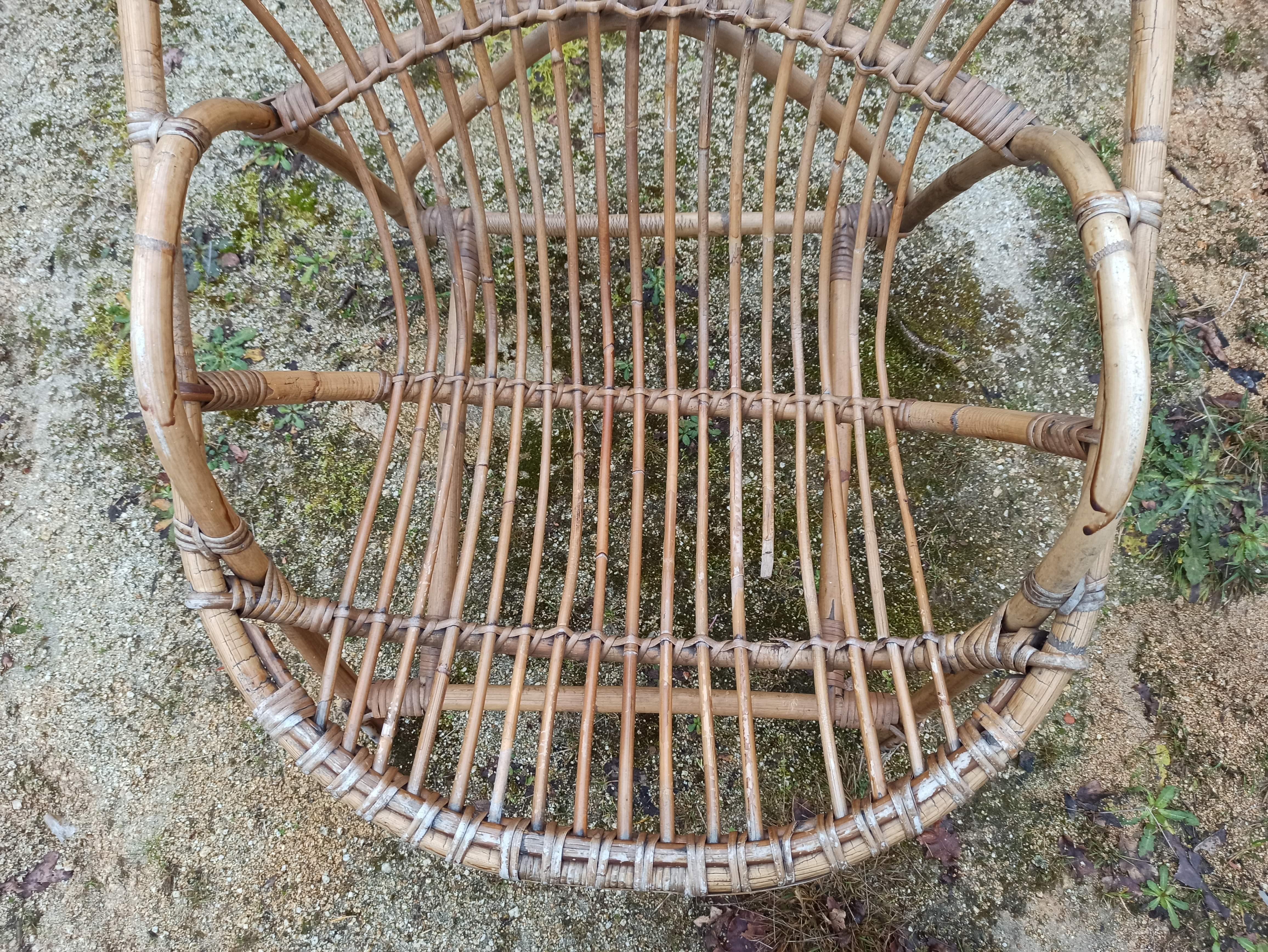 Rattan armchair with armrest