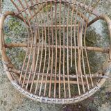 Rattan armchair with armrest