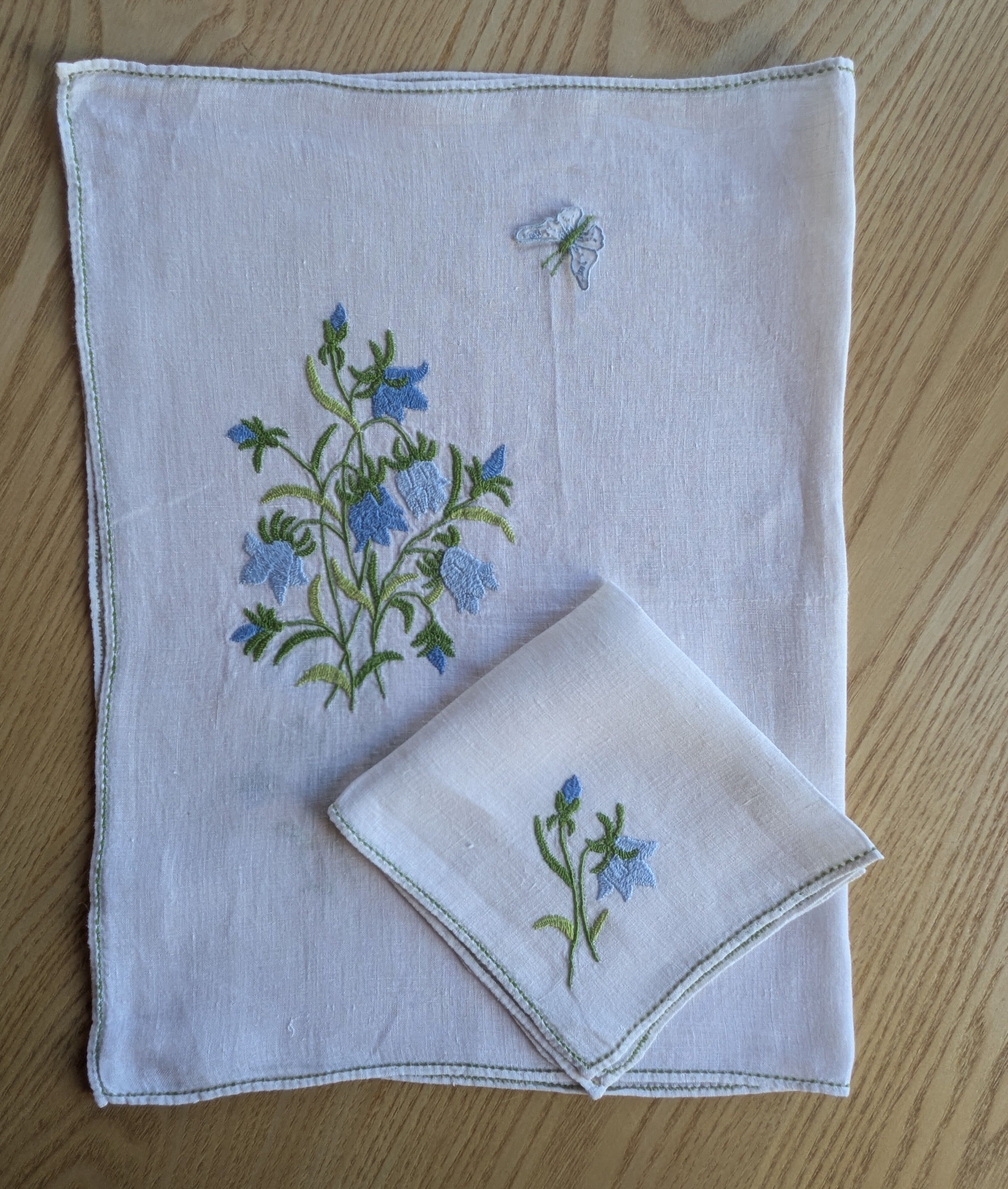 Hand-embroidered table duo in linen voile – Bluebells & Butterfly