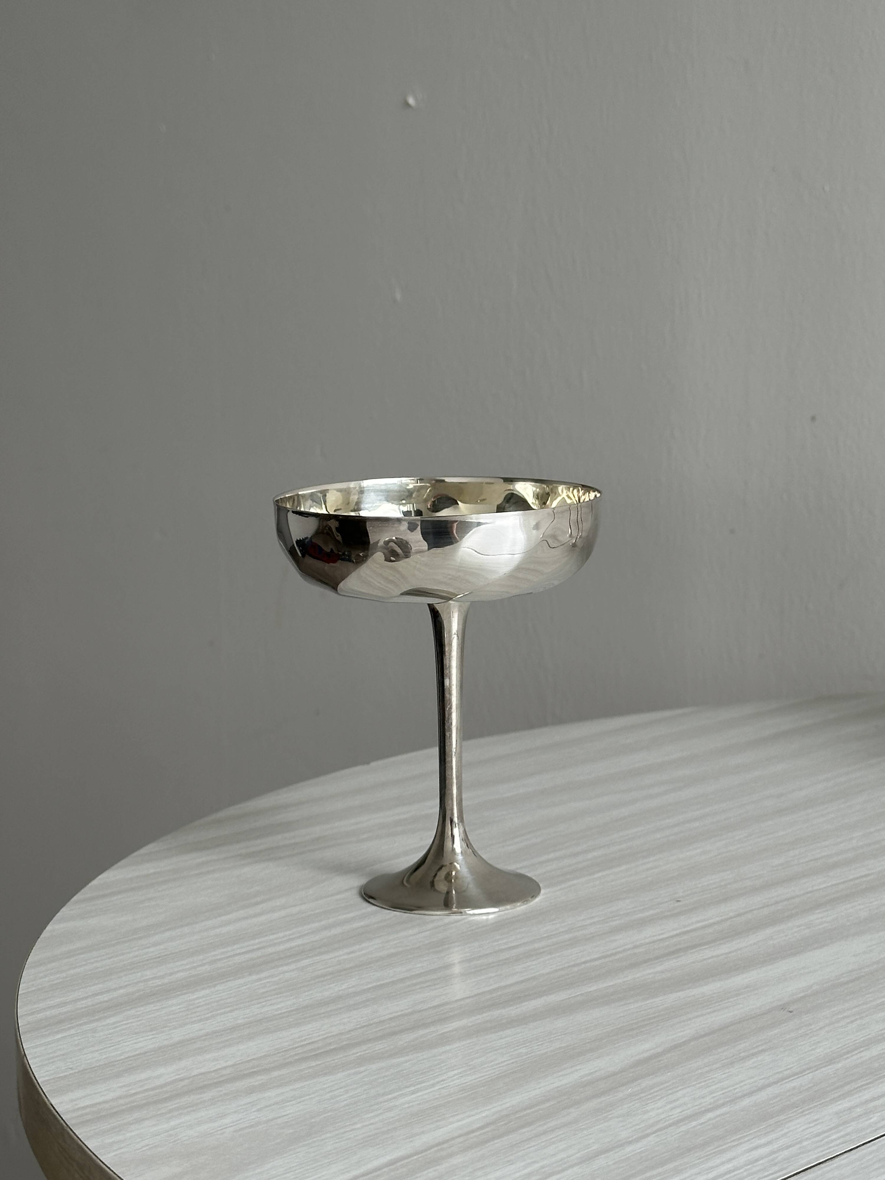 6 shiny metal footed bowls