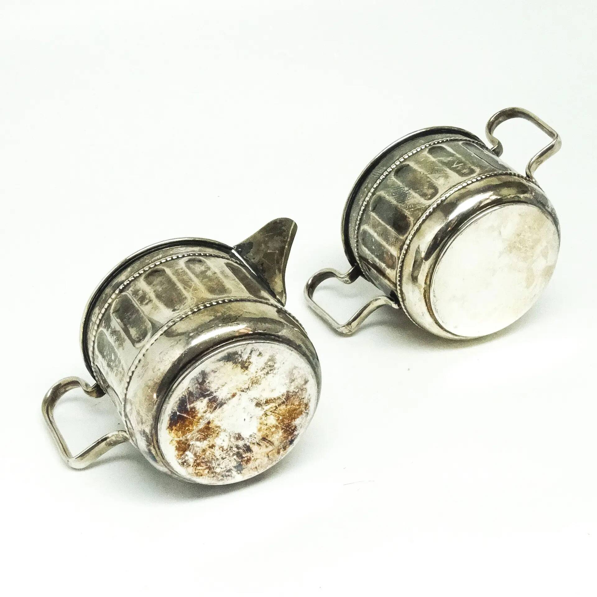 Set of sugar bowl and milk jug, neoclassicism with art deco influences, silver-plated brass, Belgium, 1930s.
