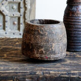 Old pot carved in wood