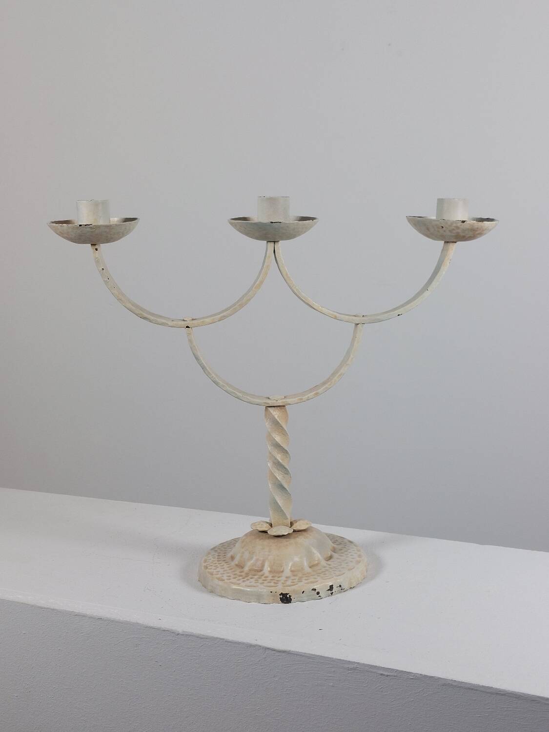 Vintage patinated lacquered metal candlestick brocante