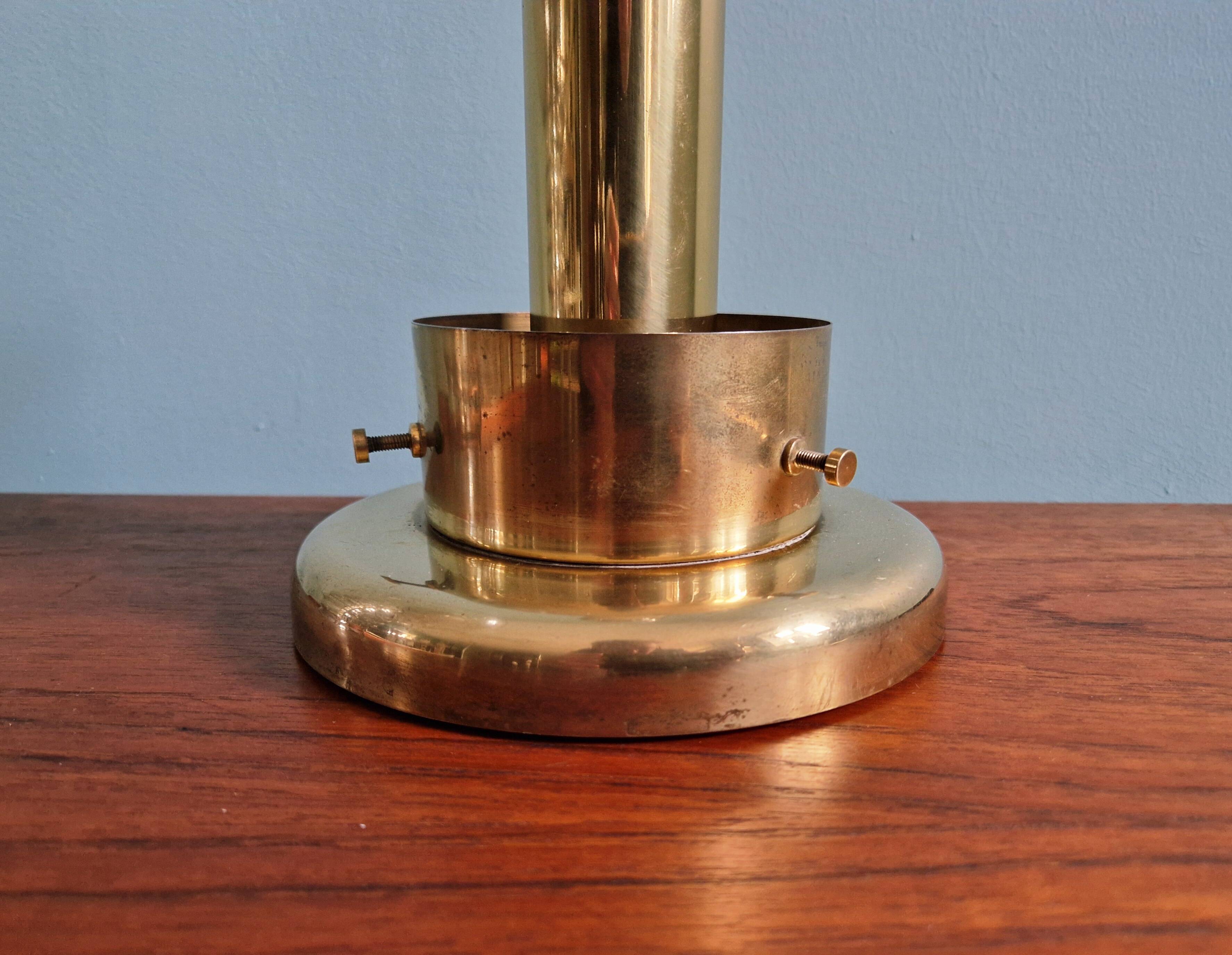 Space Age table lamp in brass and clear glass, 1960s-70s.