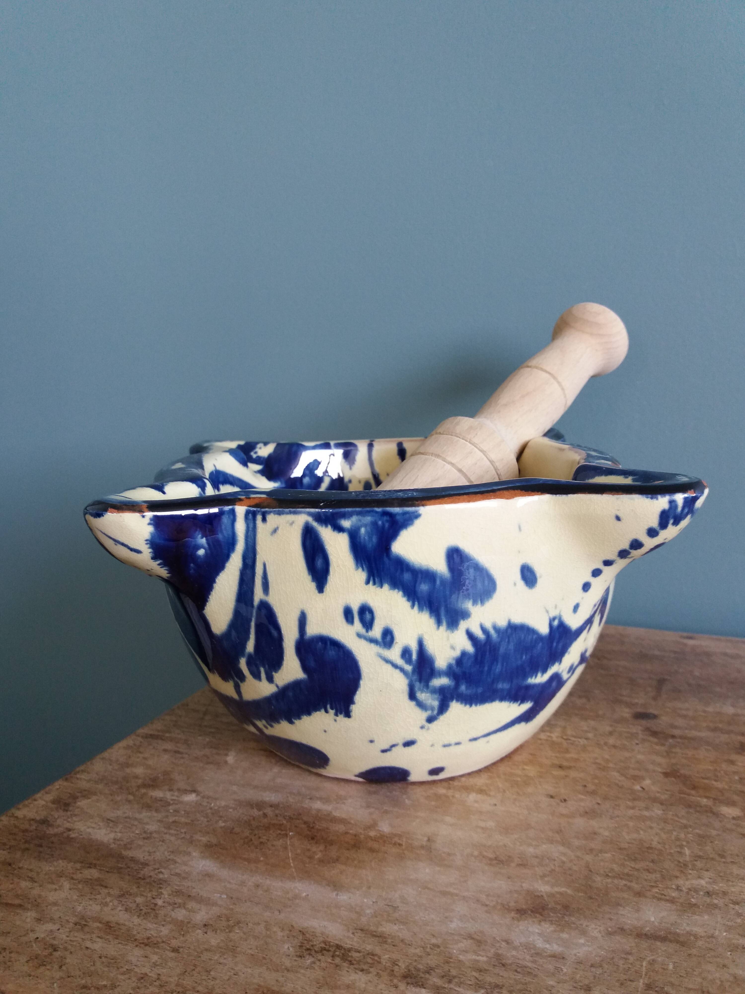 Glazed terracotta mortar and wooden pestle