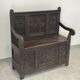 Chest bench in natural wood carved with Gothic motifs
