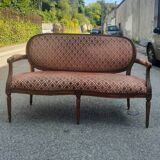 Louis XVI style sofa in natural wood