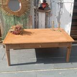 Solid wood coffee table with drawer and original key.