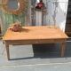 Solid wood coffee table with drawer and original key.