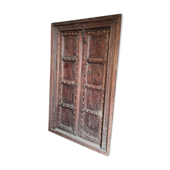 Old door with brass decorations