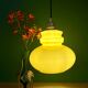 Suspension globe vintage en opaline ocre