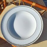 Twelve white porcelain plates