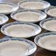9 antique ironstone plates signed Longchamp "Marcel"