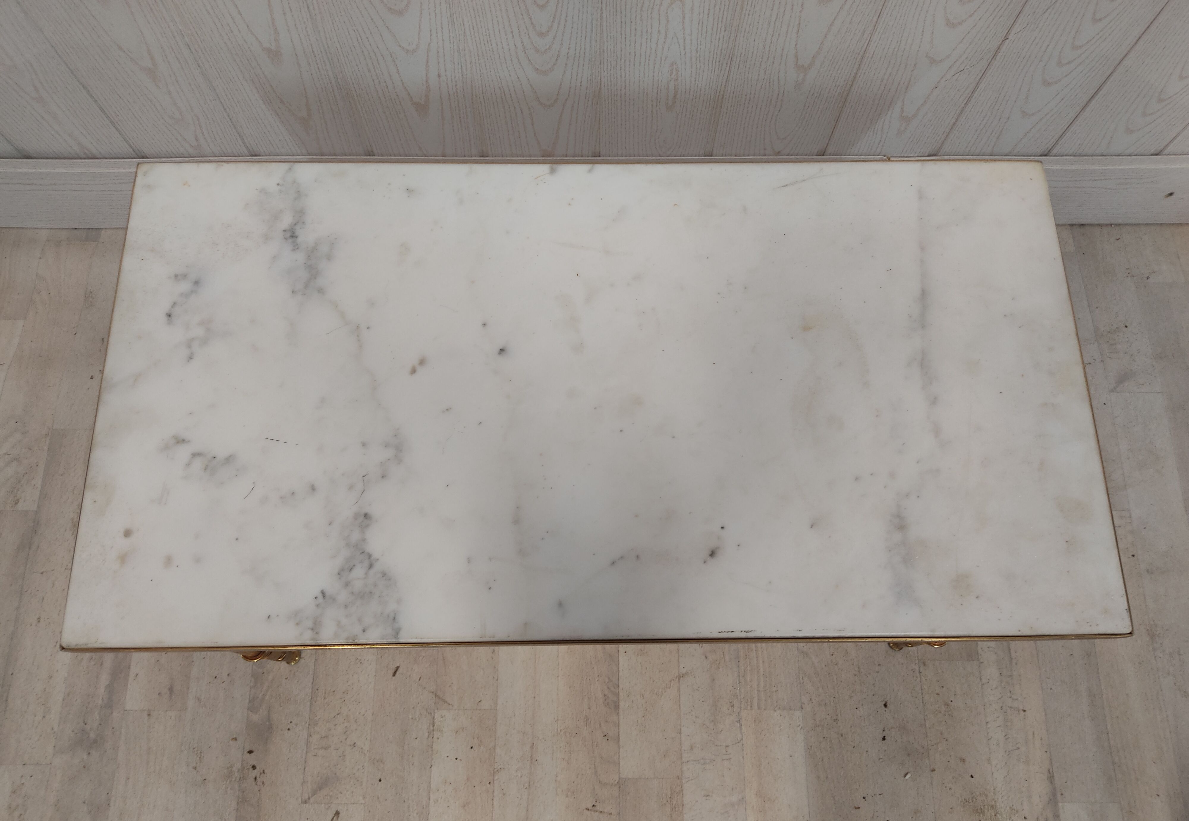 Table basse marbre blanc et métal doré