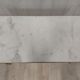 Table basse marbre blanc et métal doré
