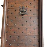 hand-forged studded castle doors + frame from the 1800s/1900s