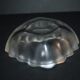 Lalique glass ashtray bowl with frosted finish, engraved with wave design, signed Lalique.