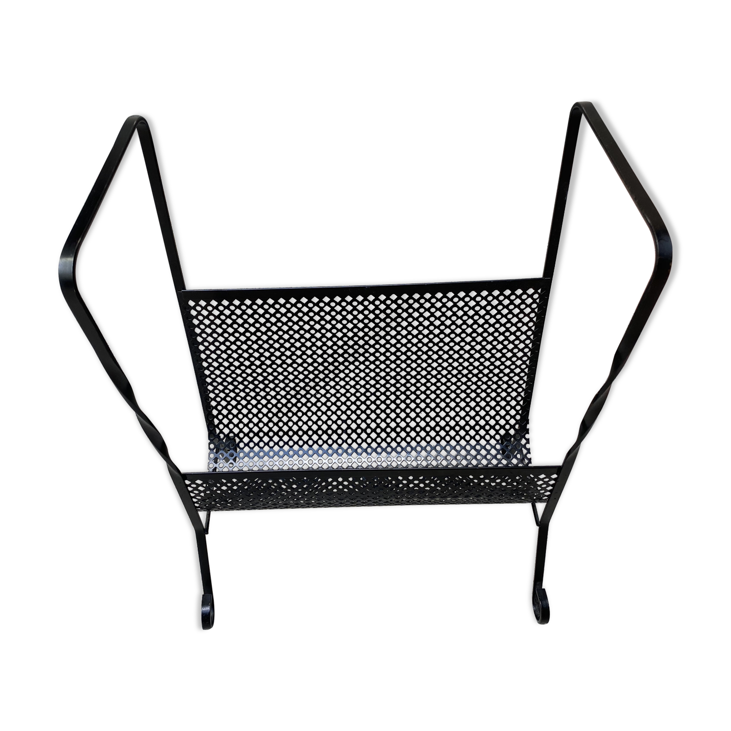 Perforated metal magazine holders - 1975