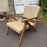Vintage wooden armchair from the 1960s
