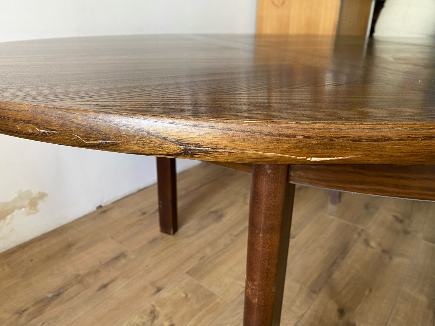 Table with an oak veneer and butterfly extension.