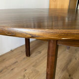 Table with an oak veneer and butterfly extension.