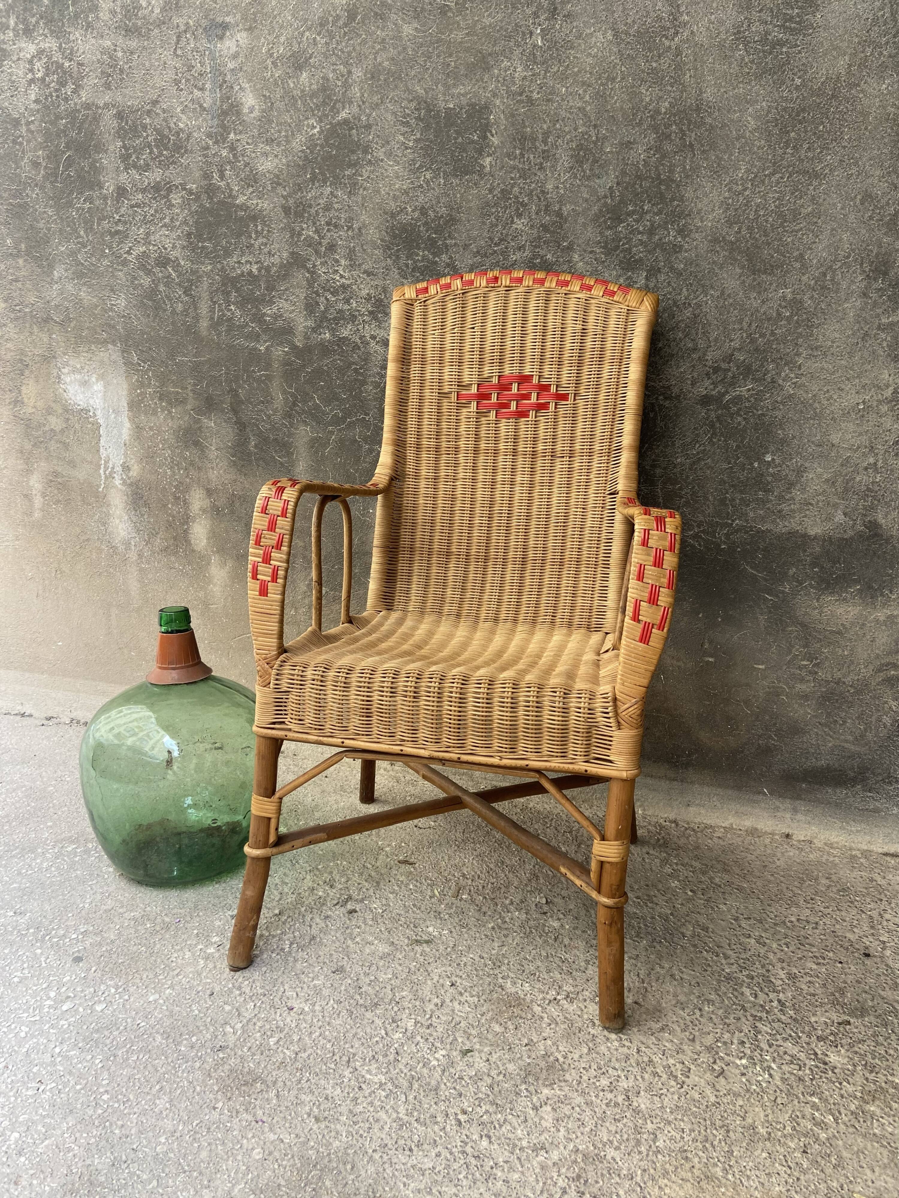 Vintage braided rattan armchair