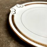 Round dish with ears in white and gold porcelain