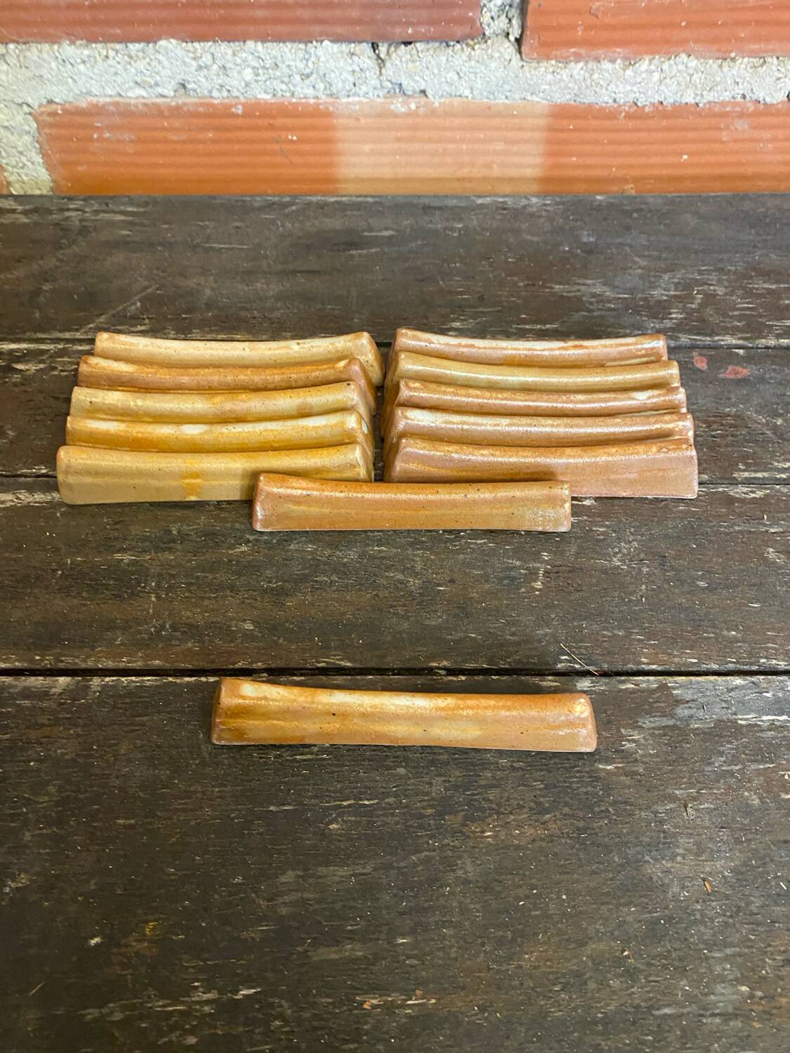 Set of 12 vintage stoneware knife rests