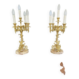 Pair of gilded bronze candlesticks, marble bases.