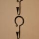 Pair of Swedish wall sconces in wrought iron, mid-20th century style, signed Akta.