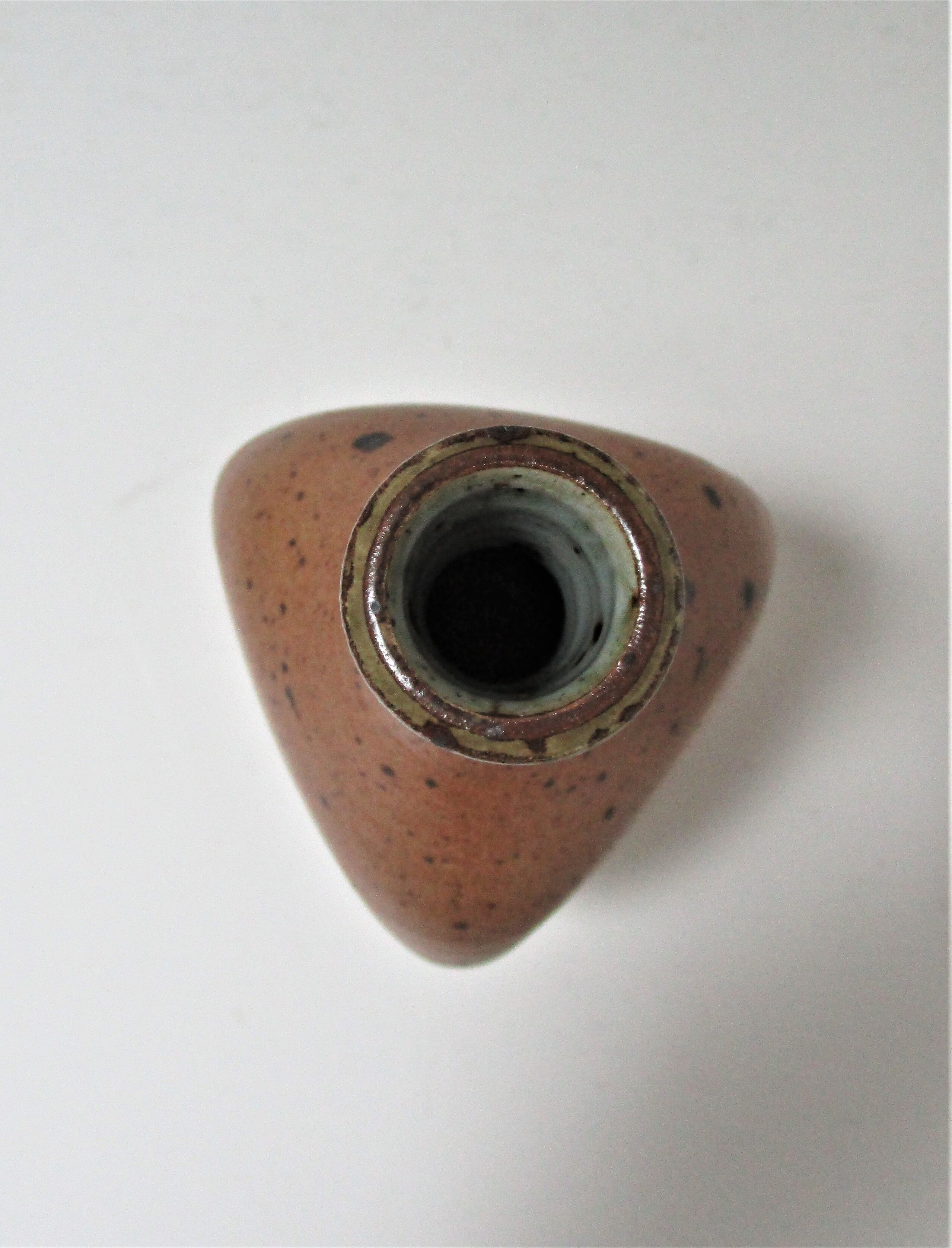 Soliflore vase in pyrite sandstone with three vintage faces