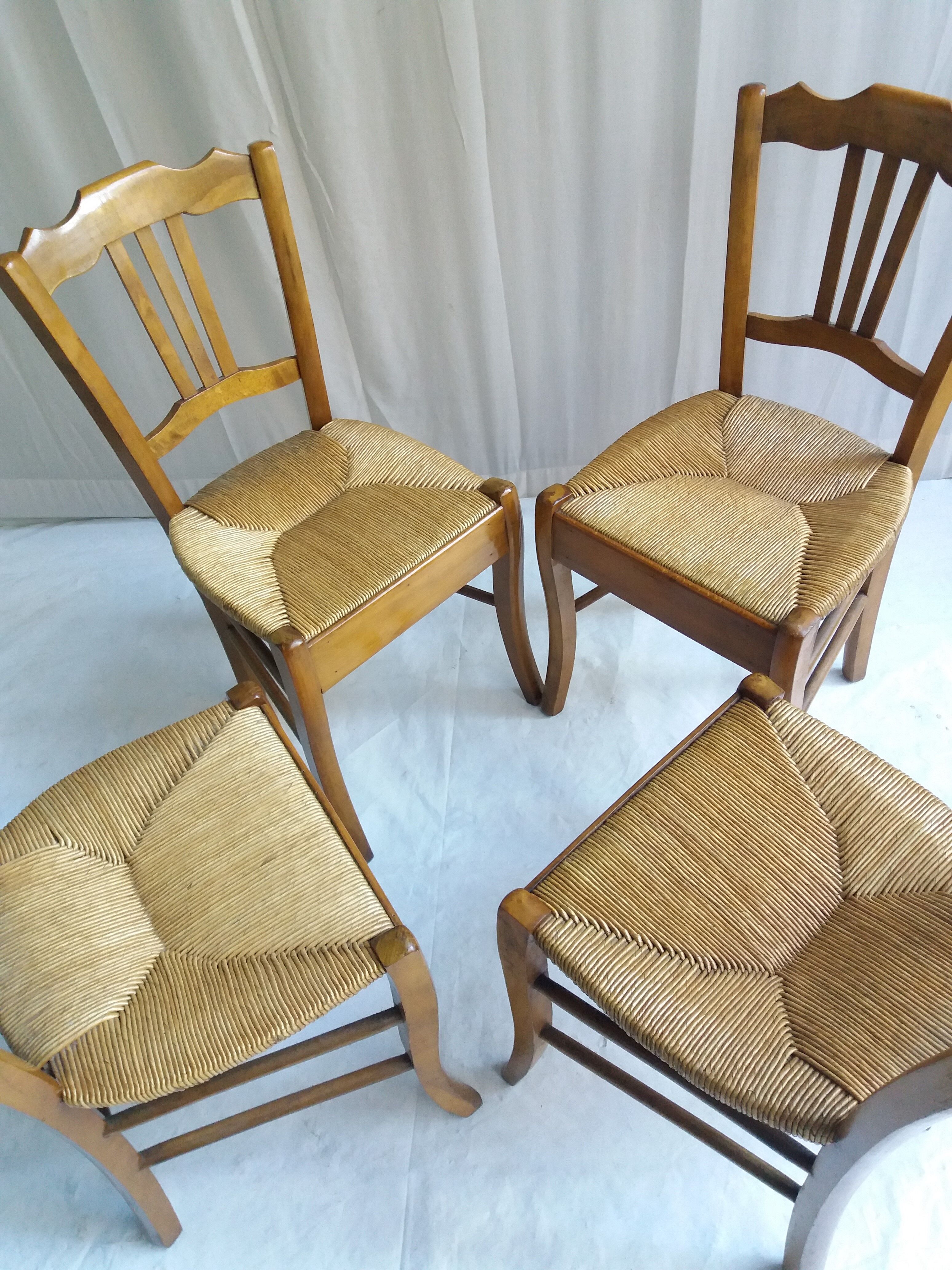 Series of 4 old mulched chairs