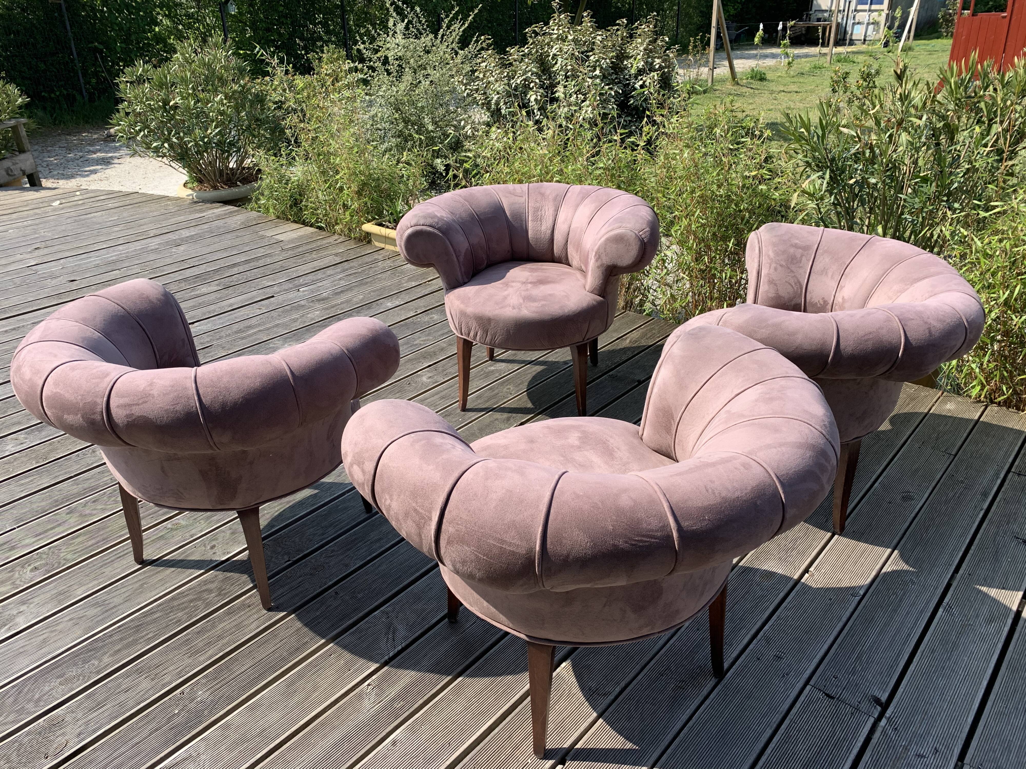Quatre fauteuils art déco